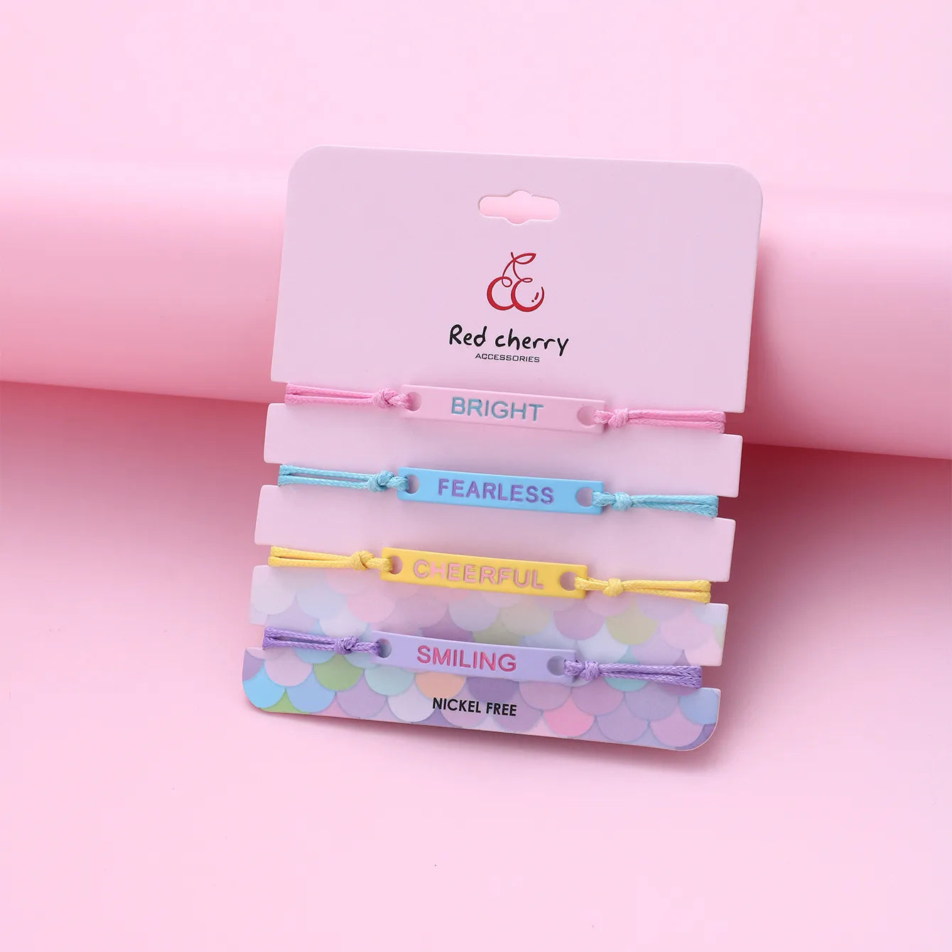 KINDER – Set mit 4 verstellbaren Kordelarmbändern – Love Hope Believe Jolly – süßer süßer Anhänger in Neonfarben